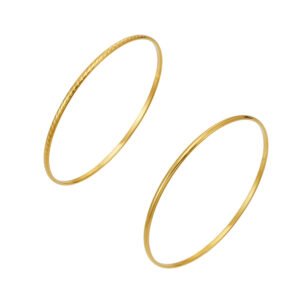 Stacked thin gold, rose gold, and silver stainless steel bangles featuring smooth polished and diamond-cut textured patterns