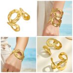 Wide hammered gold and silver plated open cuff bangle with organic oval cutout in 316L stainless steel