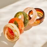 Gold plated starburst inlaid wide resin bangle bracelet in 316L stainless steel