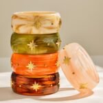 Gold plated starburst inlaid wide resin bangle bracelet in 316L stainless steel