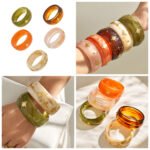Gold plated starburst inlaid wide resin bangle bracelet in 316L stainless steel