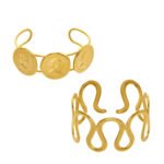 Gold and silver 316L stainless steel open cuff bangles featuring embossed Elizabeth coin medallions and a sculptural wavy cutout design