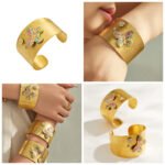 Gold plated wide brushed open cuff bangle with colorful enamel butterfly and pavé cubic zirconia clover in 316L stainless steel