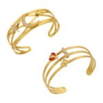 Multi band gold and silver open cuff bangles featuring pave cubic zirconia moon stars and lucky charm motifs in 316L stainless steel