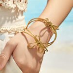 Gold and silver multi-strand wire bow knot open cuff bangle bracelet in polished 316L stainless steel