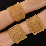 Statement wide open cuff bangle crafted with woven metallic wire structure in 18K gold and silver plated 316L stainless steel
