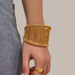 Statement wide open cuff bangle crafted with woven metallic wire structure in 18K gold and silver plated 316L stainless steel